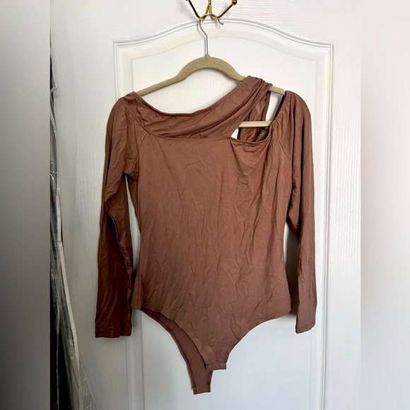 One Piece with Shoulder Detail - Picture 1 of 1